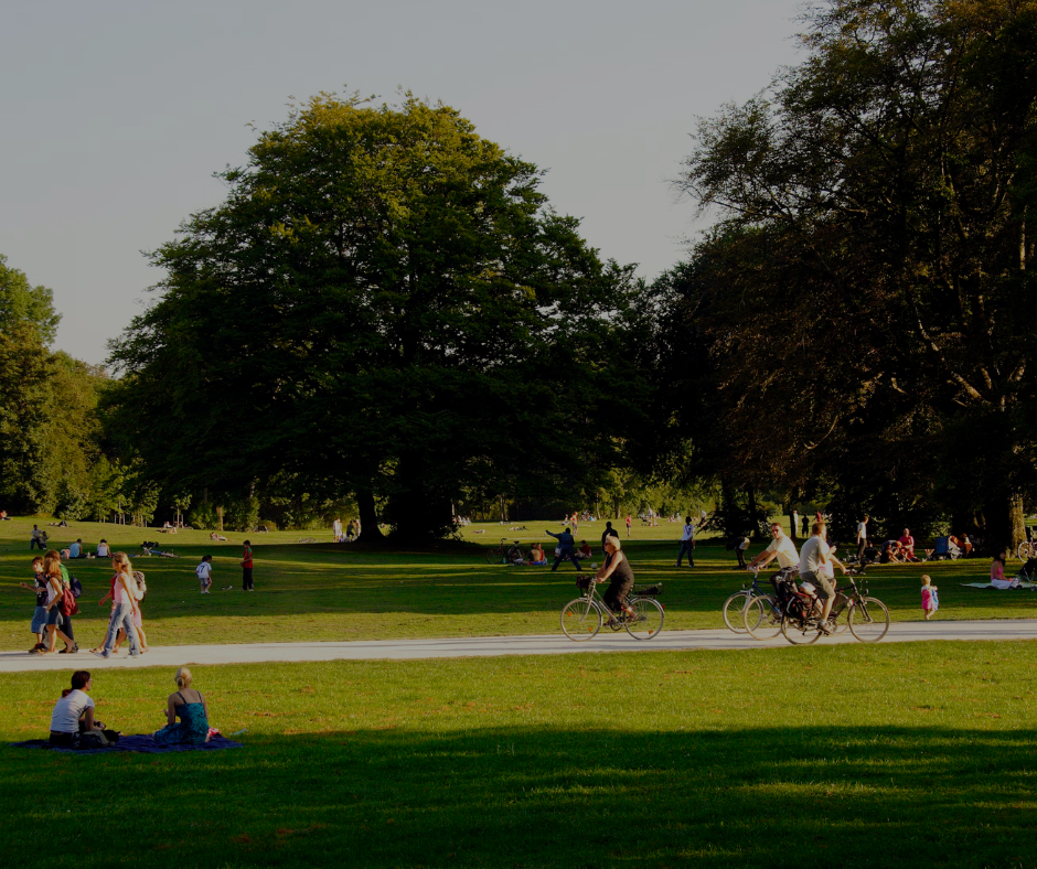 A sunny park in Edinburgh with people taking leisure time